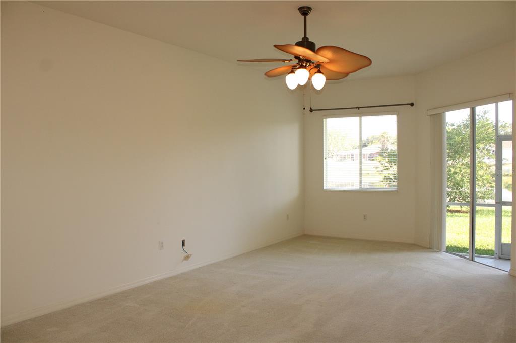 11257 28th St Circle East Parrish, FL 34219 - Photo 21 of 59 an empty room with a window