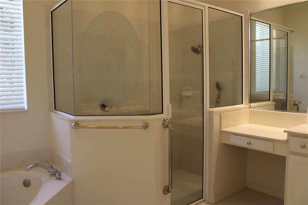 11257 28th St Circle East Parrish, FL 34219 - Photo 23 of 59 a bathroom with a shower and a sink