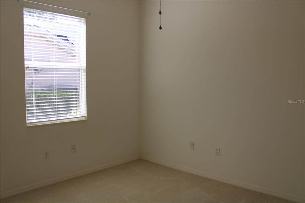 11257 28th St Circle East Parrish, FL 34219 - Photo 33 of 59 a view of an empty room with a window