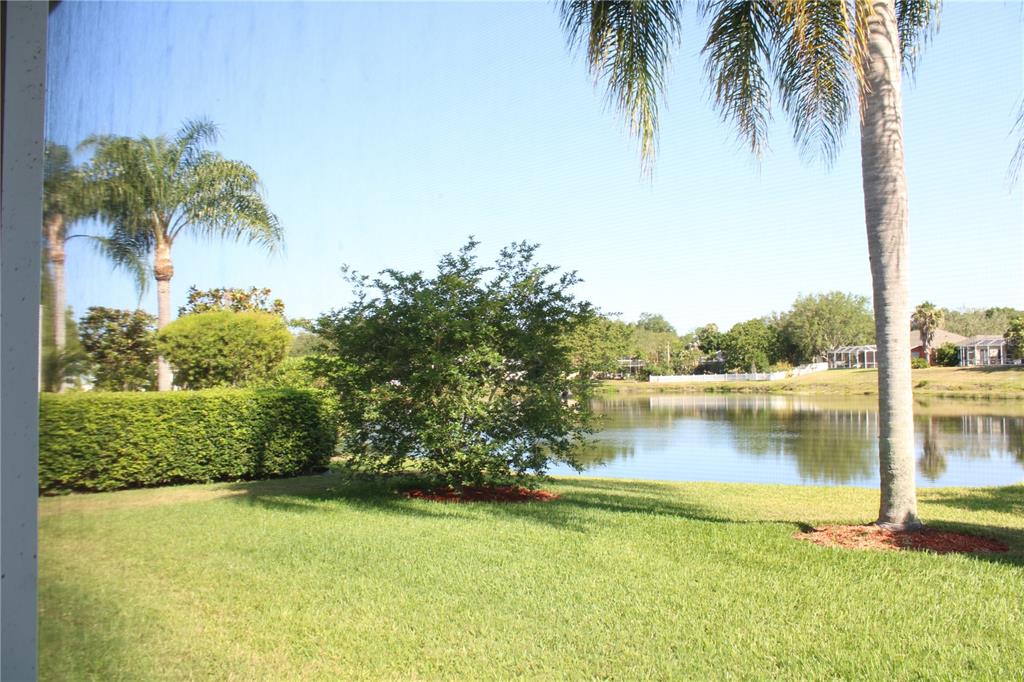 11257 28th St Circle East Parrish, FL 34219 - Photo 41 of 59 a view of a lake with a beach