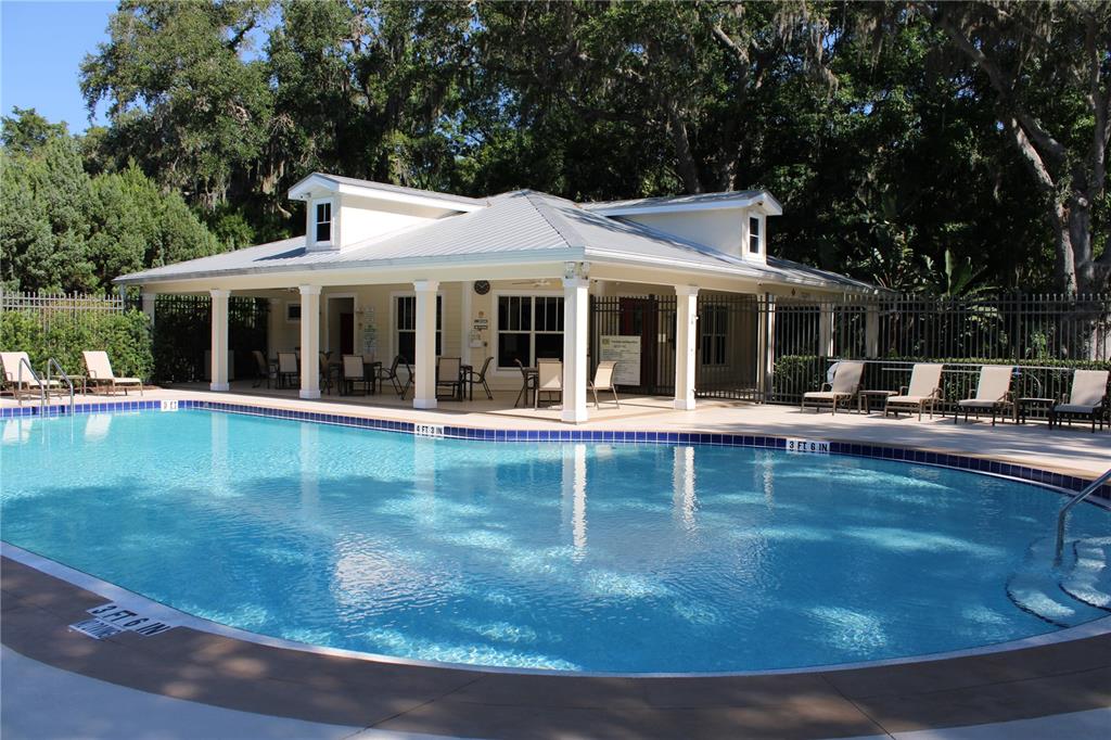 11257 28th St Circle East Parrish, FL 34219 - Photo 47 of 59 a view of a house with swimming pool and sitting area