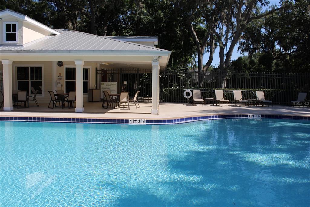 11257 28th St Circle East Parrish, FL 34219 - Photo 48 of 59 a house view with swimming pool and sitting space