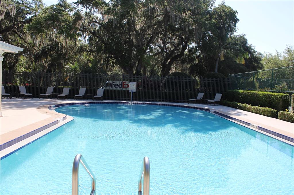 11257 28th St Circle East Parrish, FL 34219 - Photo 50 of 59 a view of a swimming pool with a patio