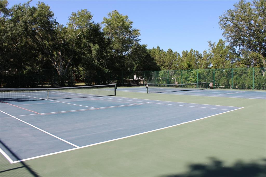 11257 28th St Circle East Parrish, FL 34219 - Photo 53 of 59 a view of tennis court