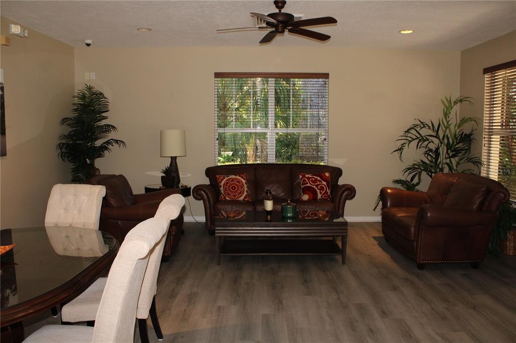 11257 28th St Circle East Parrish, FL 34219 - Photo 54 of 59 a living room with furniture and a large window