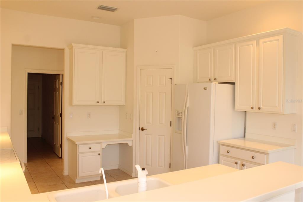 11257 28th St Circle East Parrish, FL 34219 - Photo 6 of 59 a bedroom with a bed and a dresser