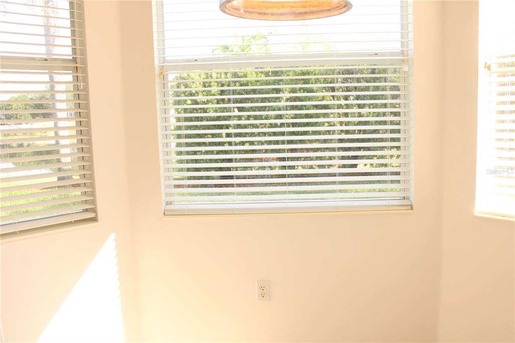 11257 28th St Circle East Parrish, FL 34219 - Photo 9 of 59 a view of a large window with a outdoor space