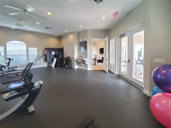a view of a room with gym equipment