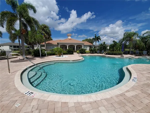 a view of a swimming pool with a fountain