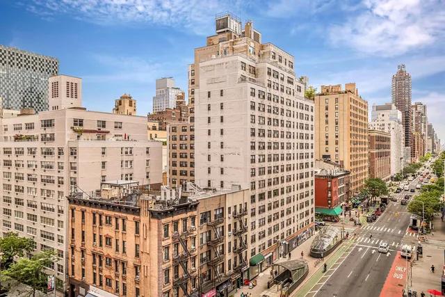 a view of a city with tall buildings