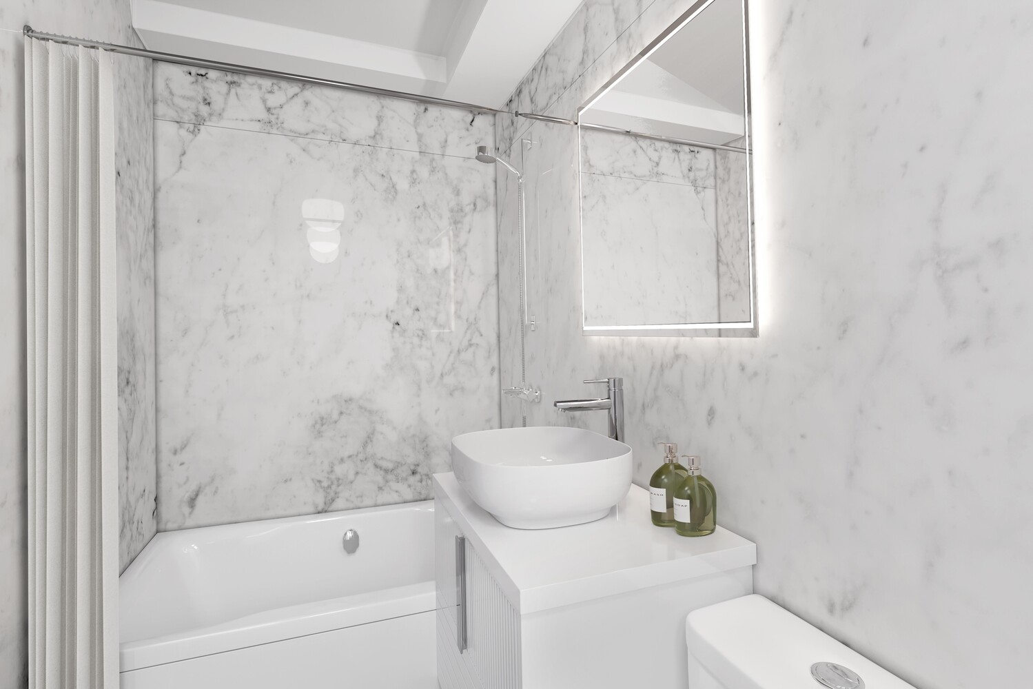 233 East 70th Street, Unit 10T Manhattan, NY 10021 - Photo 12 of 14 a bathroom with a sink a toilet and a bathtub