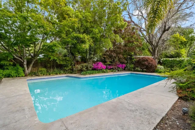 a view of a outdoor space with swimming pool