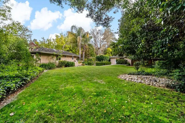 a view of a house with a big yard