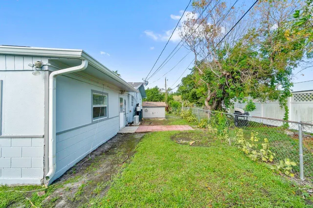 a house view with a garden space