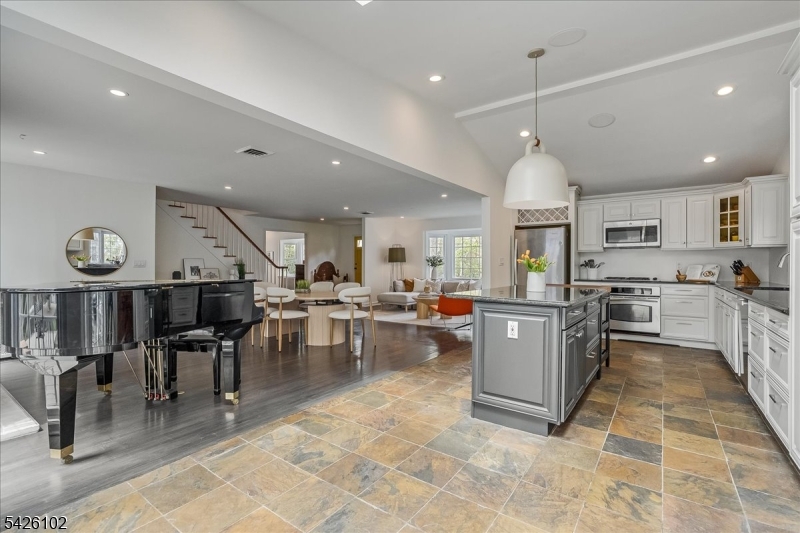 8 Lessing Road West Orange, NJ 07052 - Photo 10 of 40 a large kitchen with lots of counter space and windows