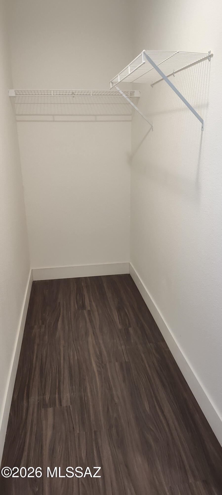 18565 West McClean Road Marana, AZ 85653 - Photo 22 of 37 a view of a room with wooden floor