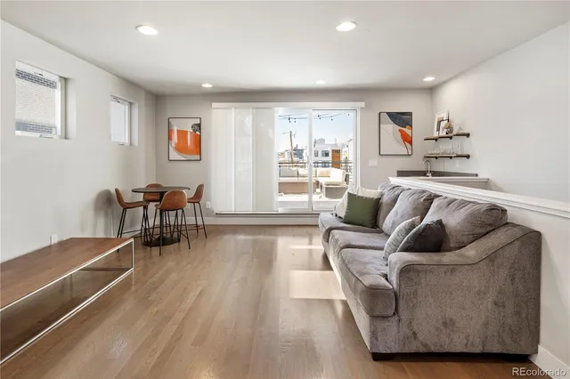 a living room with furniture and a couch