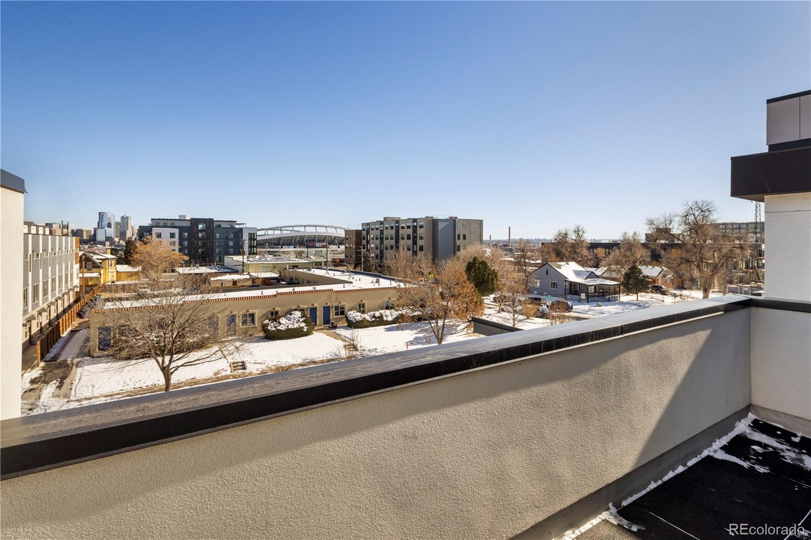 1815 Grove Street Denver, CO 80204 - Photo 31 of 36 a view of a balcony with an outdoor seating