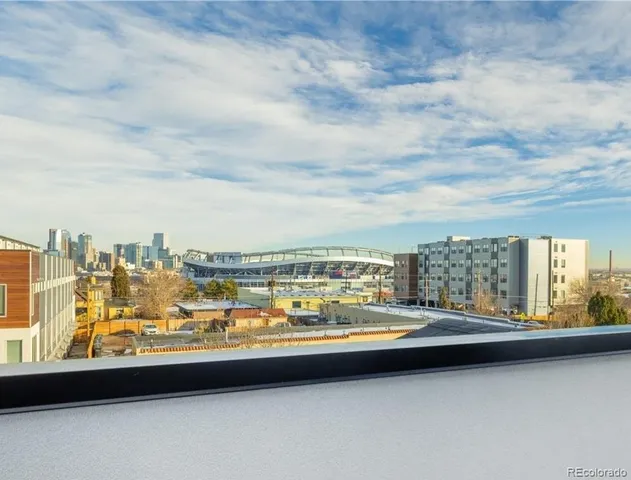 a view of a building with a street