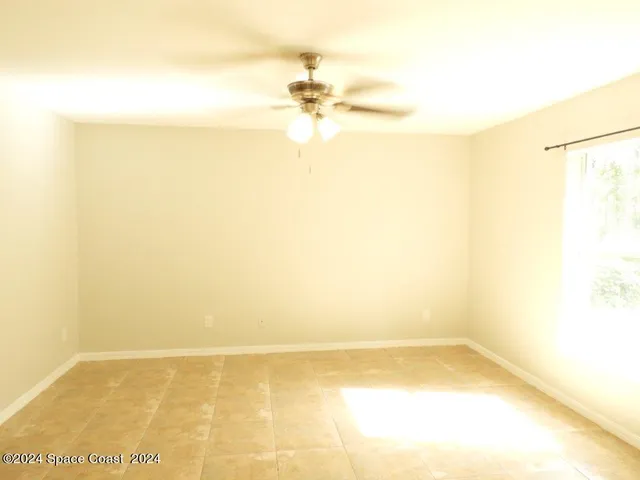 a view of a room with an empty space