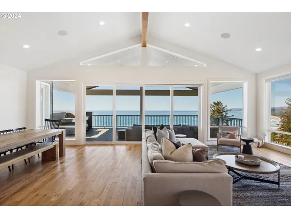 a living room with furniture and a table