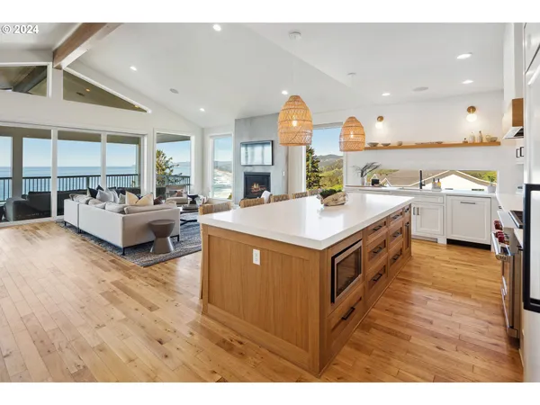 a kitchen with a sink and wooden cabinets