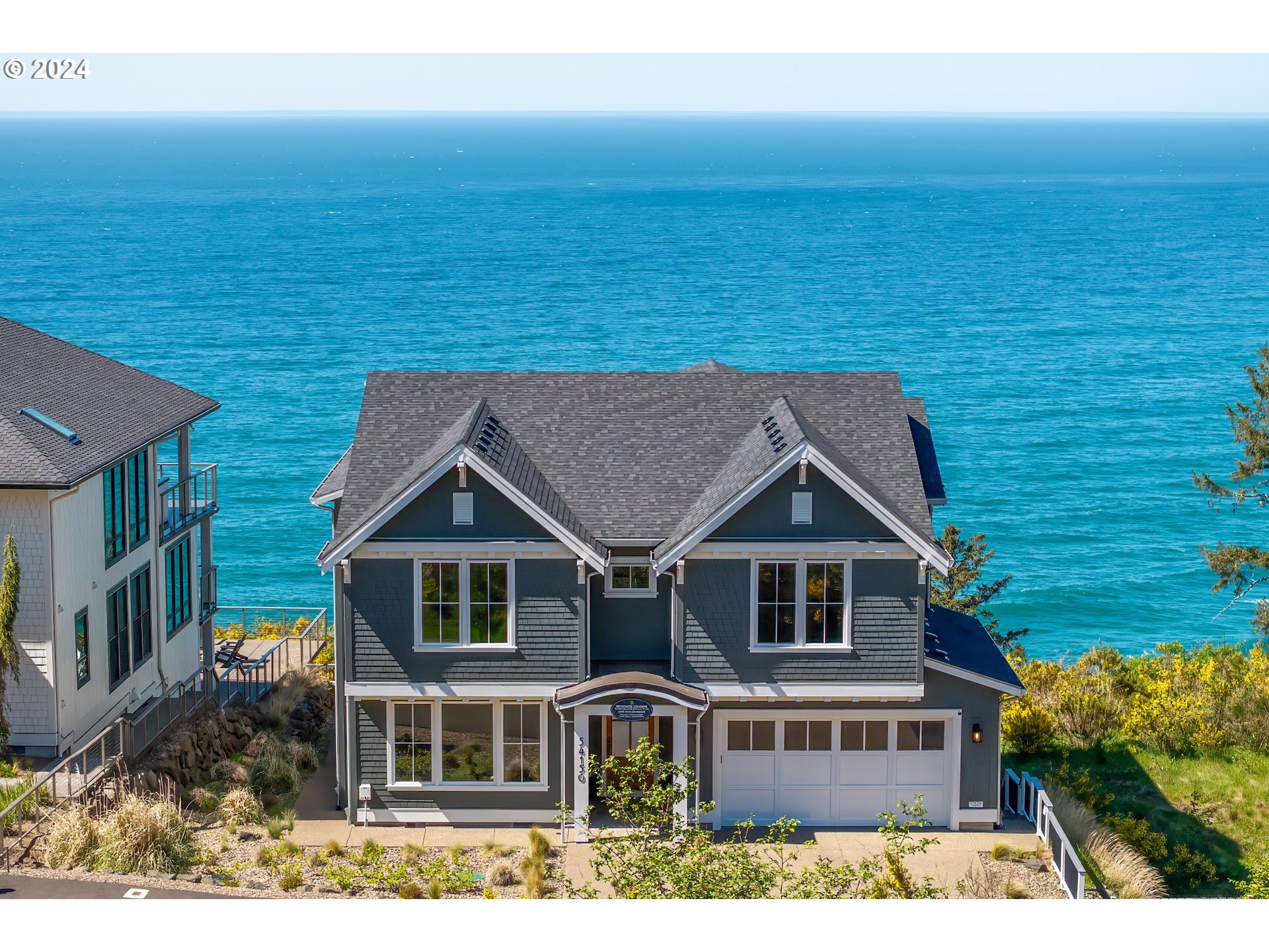54150 South Beach Road Neskowin, OR 97149 - Photo 2 of 48 a aerial view of house with an ocean view