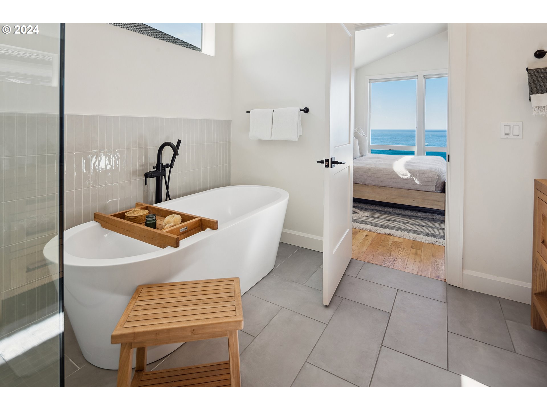 54150 South Beach Road Neskowin, OR 97149 - Photo 27 of 48 a living room with furniture and a table