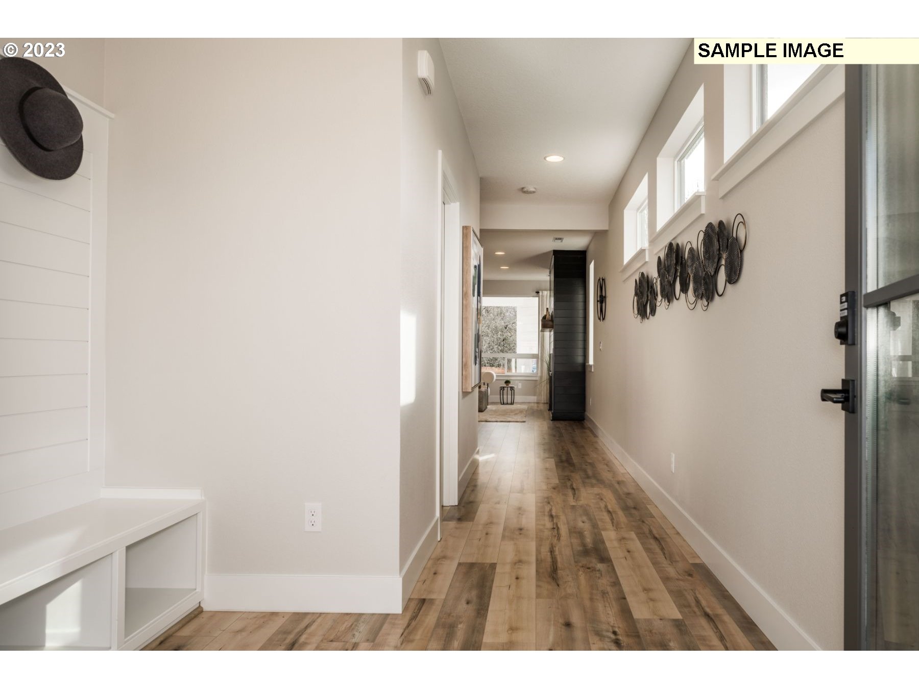 1009 South 46th Place Ridgefield, WA 98642 - Photo 3 of 12 a view of hallway with wooden floor