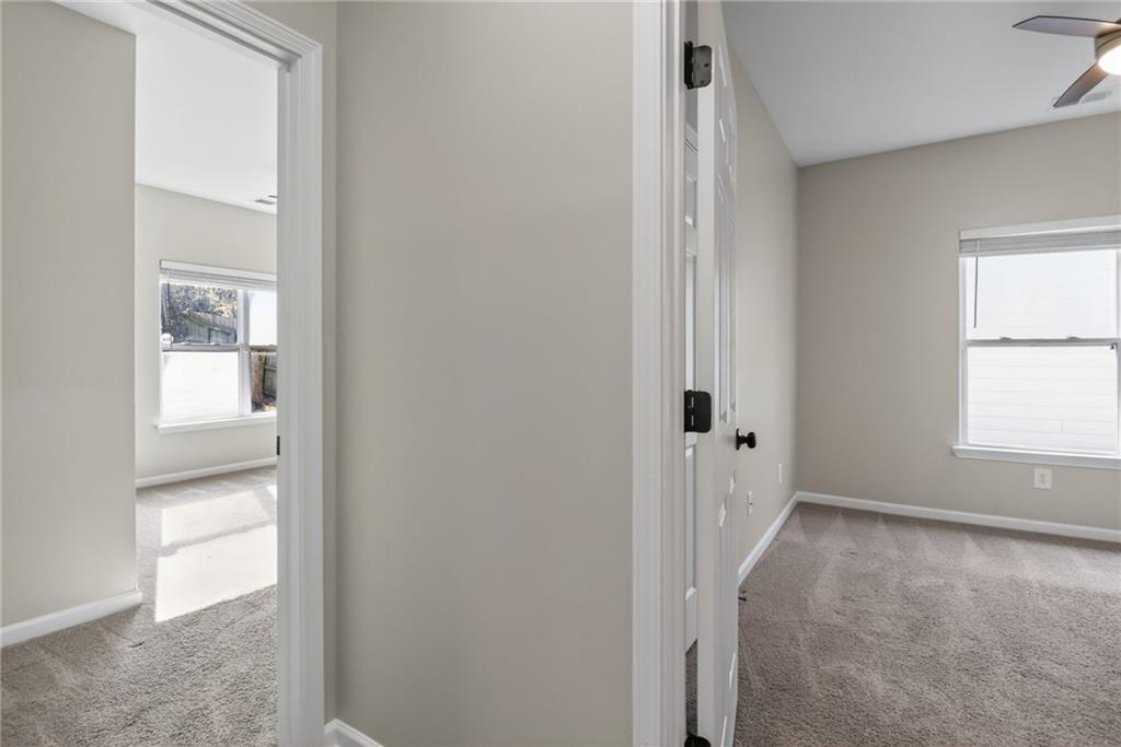 991 Ada Avenue Northwest Atlanta, GA 30318 - Photo 17 of 32 an empty room with windows