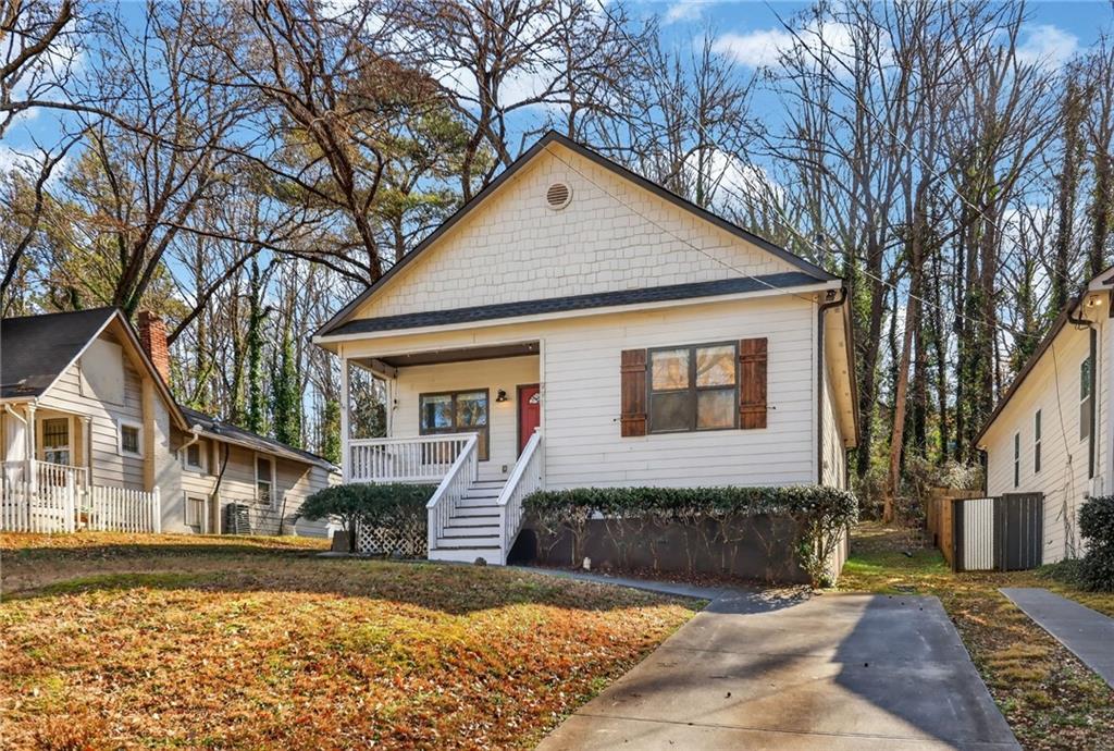 991 Ada Avenue Northwest Atlanta, GA 30318 - Photo 2 of 32 a view of a house with a yard