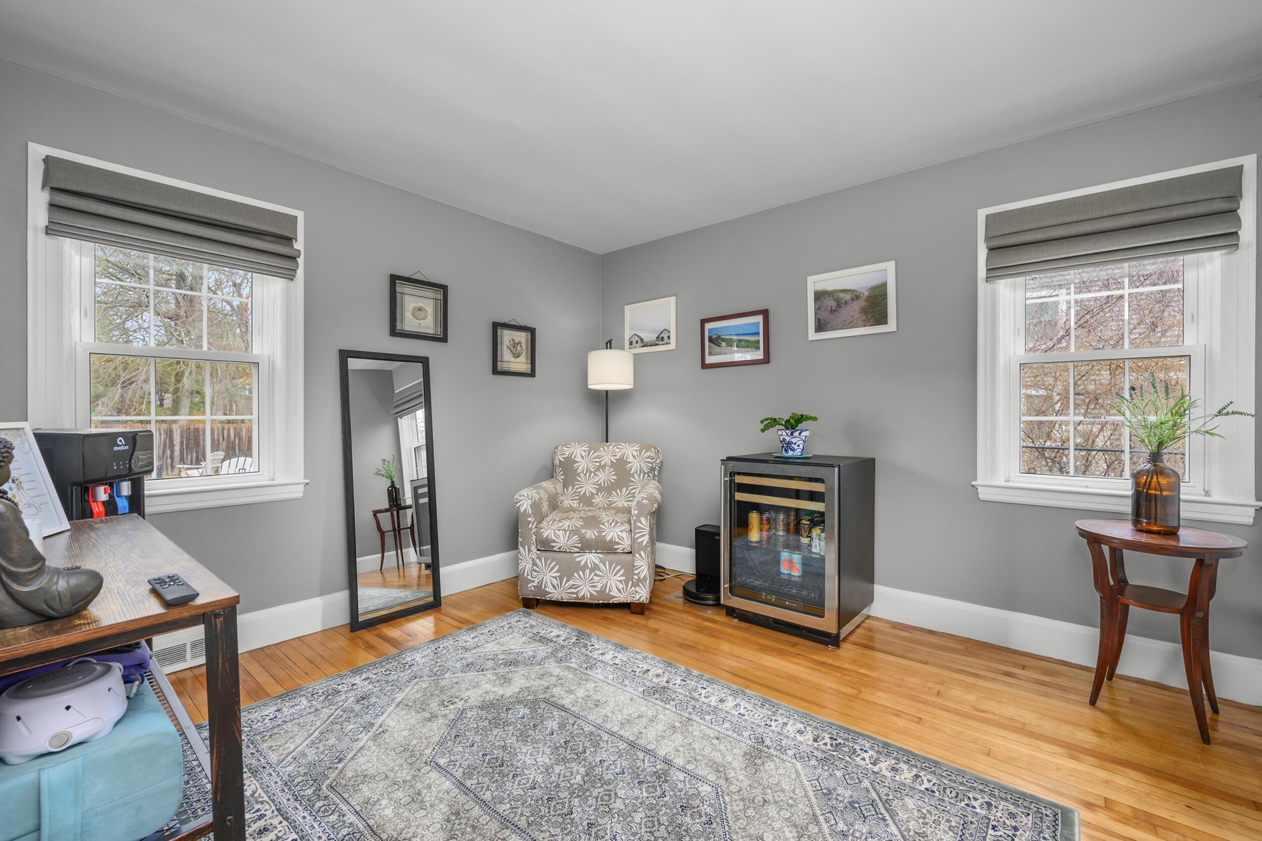 442 Pine Street Centerville, MA 02632 - Photo 17 of 43 a living room with furniture and a fireplace