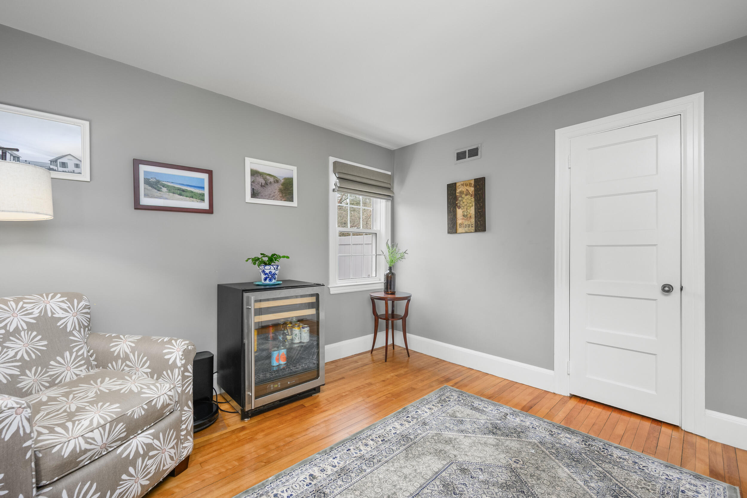 442 Pine Street Centerville, MA 02632 - Photo 18 of 43 a living room with furniture and a fireplace