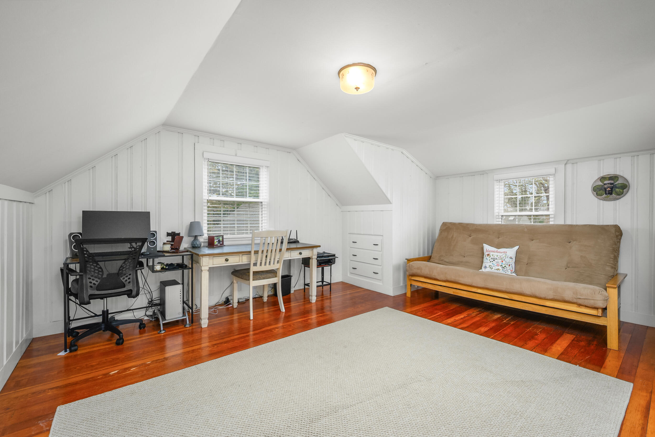 442 Pine Street Centerville, MA 02632 - Photo 24 of 43 a living room with furniture a piano and a flat screen tv