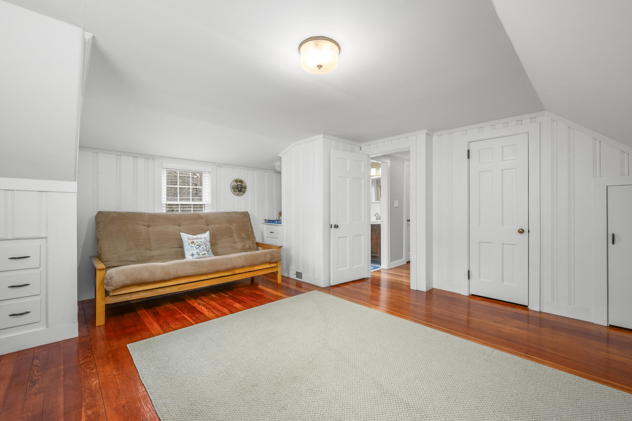 442 Pine Street Centerville, MA 02632 - Photo 25 of 43 a living room with furniture and a wooden floor