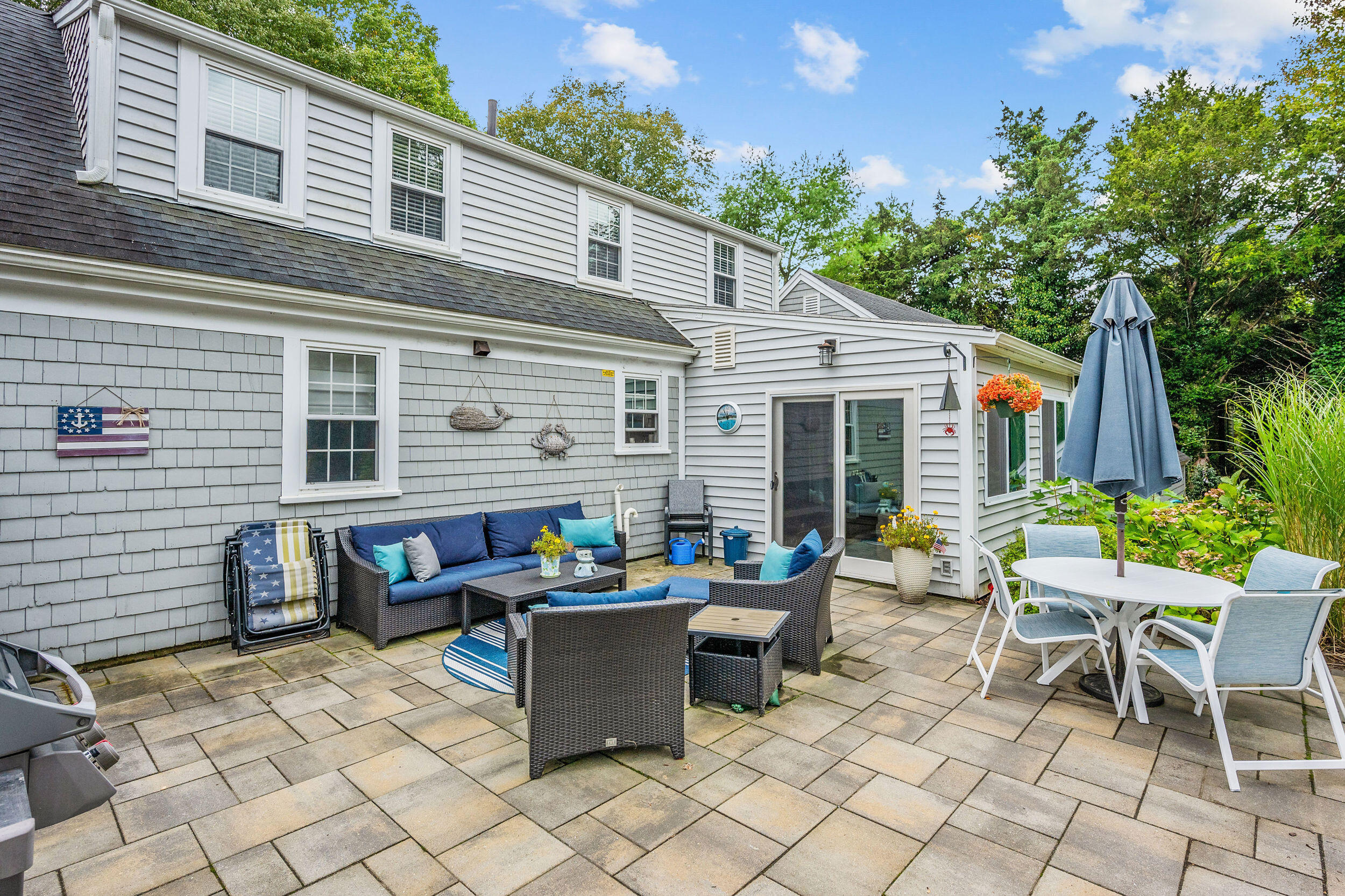 442 Pine Street Centerville, MA 02632 - Photo 27 of 43 a outdoor space with lots of tables and chairs