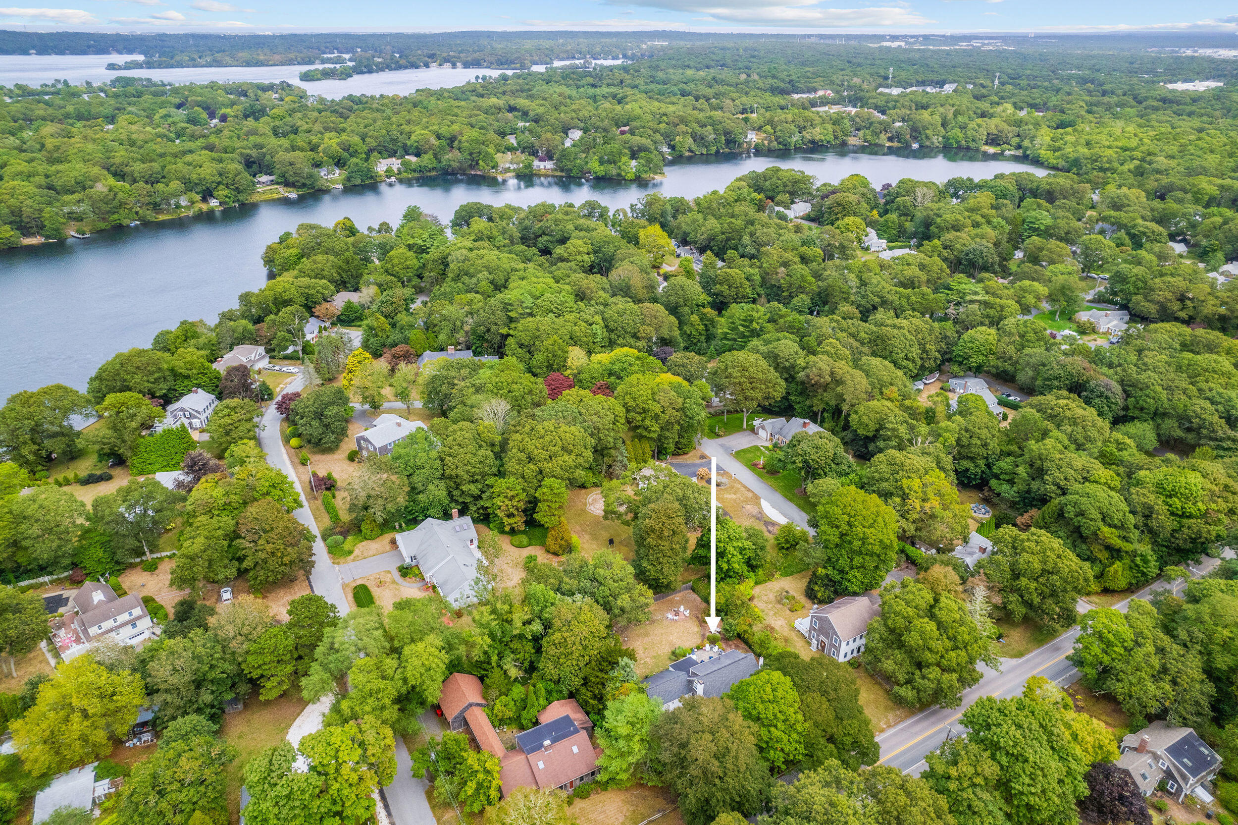 442 Pine Street Centerville, MA 02632 - Photo 32 of 43 a view of a lake with a house