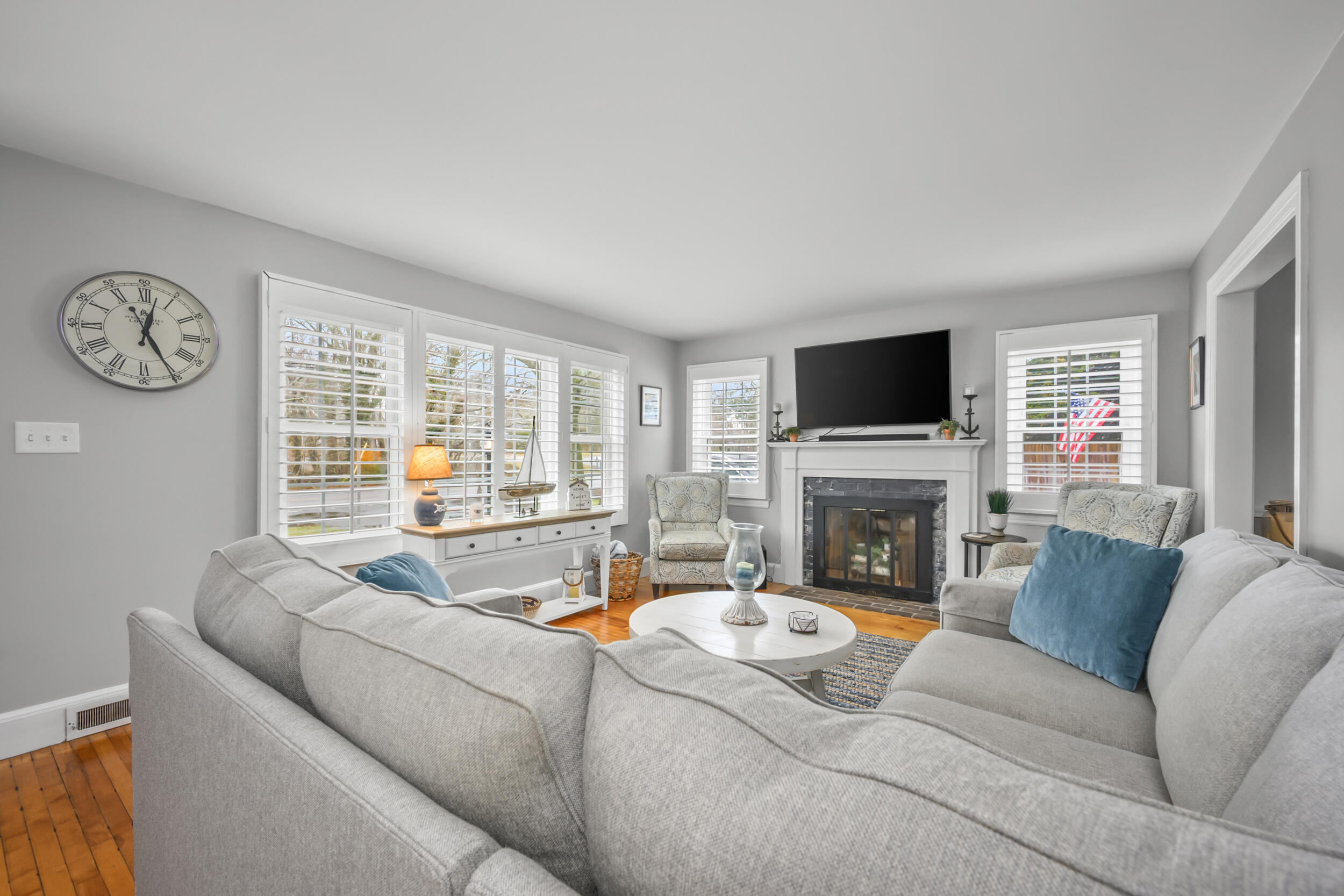 442 Pine Street Centerville, MA 02632 - Photo 5 of 43 a living room with furniture fireplace and a flat screen tv