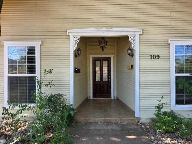 a front view of a house with a shower