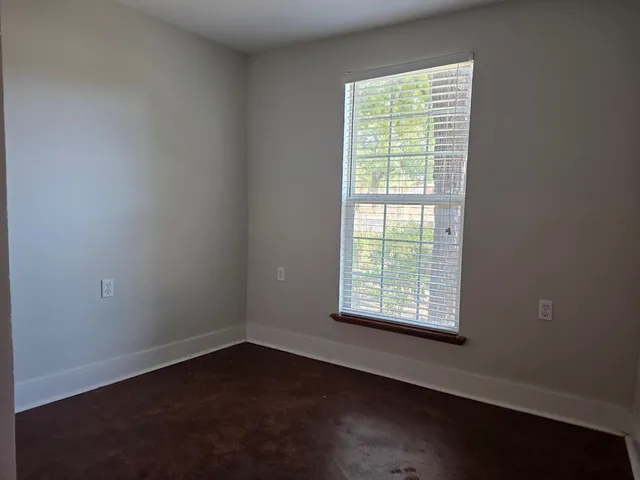 an empty room with a window