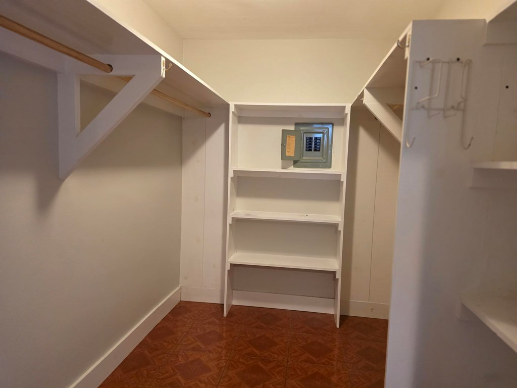 109 West Travis Street, Unit MH Fredericksburg, TX 78624 - Photo 7 of 24 a view of an empty walk in closet