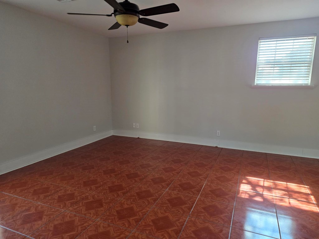 109 West Travis Street, Unit MH Fredericksburg, TX 78624 - Photo 10 of 24 an empty room with a window