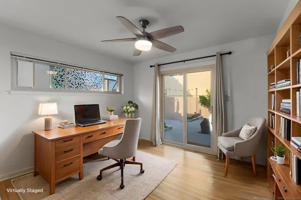 a workspace with furniture and a window