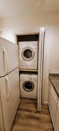 a utility room with washer and dryer