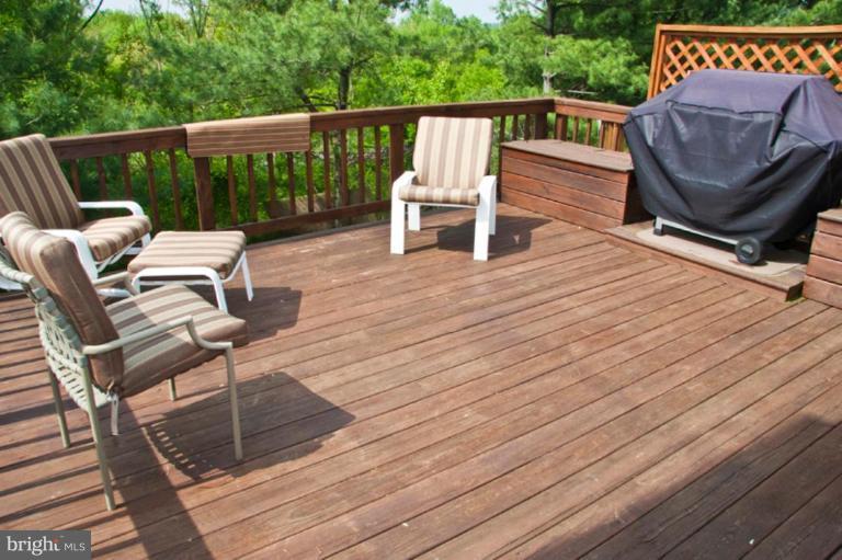 4440 Cole Farm Road Nottingham, MD 21236 - Photo 1 of 26 a view of a chairs on the roof deck