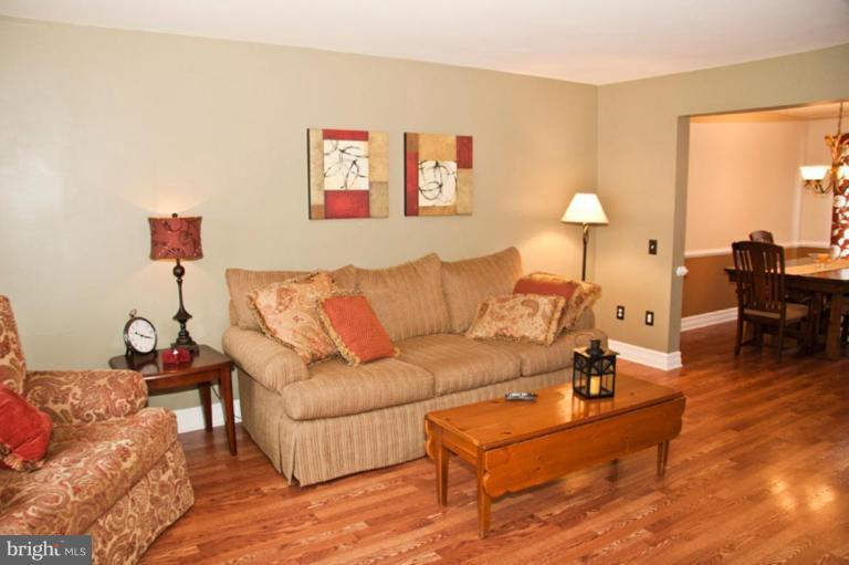 4440 Cole Farm Road Nottingham, MD 21236 - Photo 17 of 26 a living room with furniture and a table