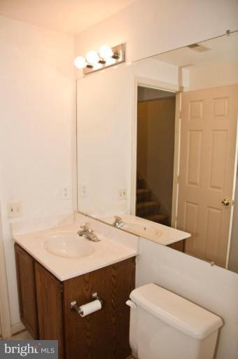 4440 Cole Farm Road Nottingham, MD 21236 - Photo 22 of 26 a bathroom with a sink a toilet and shower
