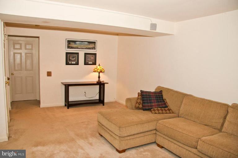 4440 Cole Farm Road Nottingham, MD 21236 - Photo 23 of 26 a living room with furniture and a window
