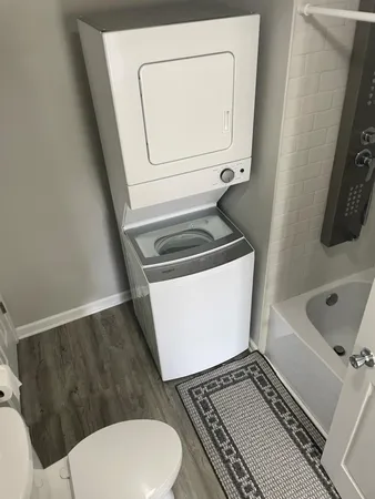 a bathroom with a toilet and a sink