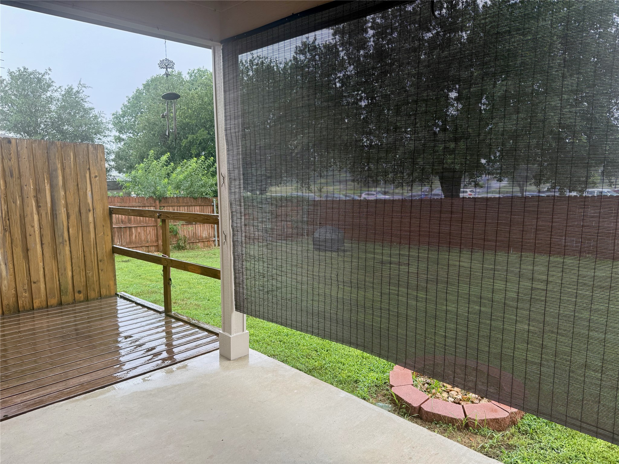 315 Nottingham Loop Kyle, TX 78640 - Photo 13 of 16 An inviting covered patio features ample space for outdoor enjoyment and a private fenced yard.